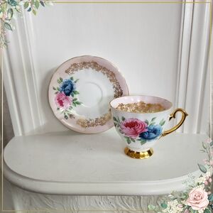 Windsor Teacup & Saucer With Pink And Blue Roses, rare find